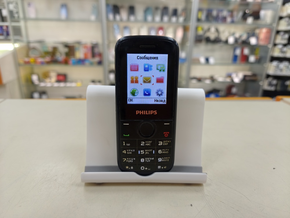Мобильный телефон Philips E120