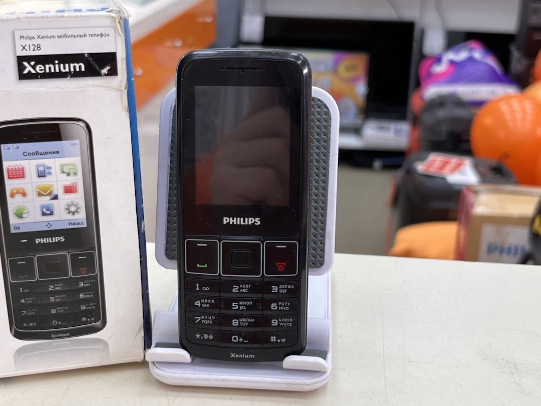 Мобильный телефон Philips X128