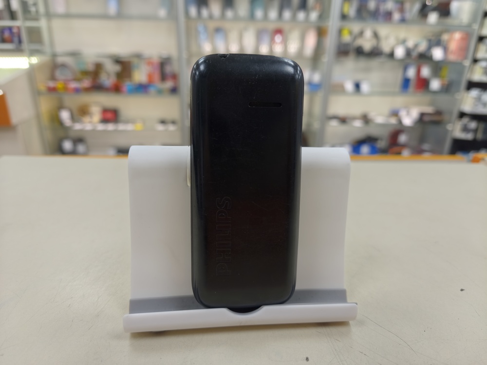 Мобильный телефон Philips E120