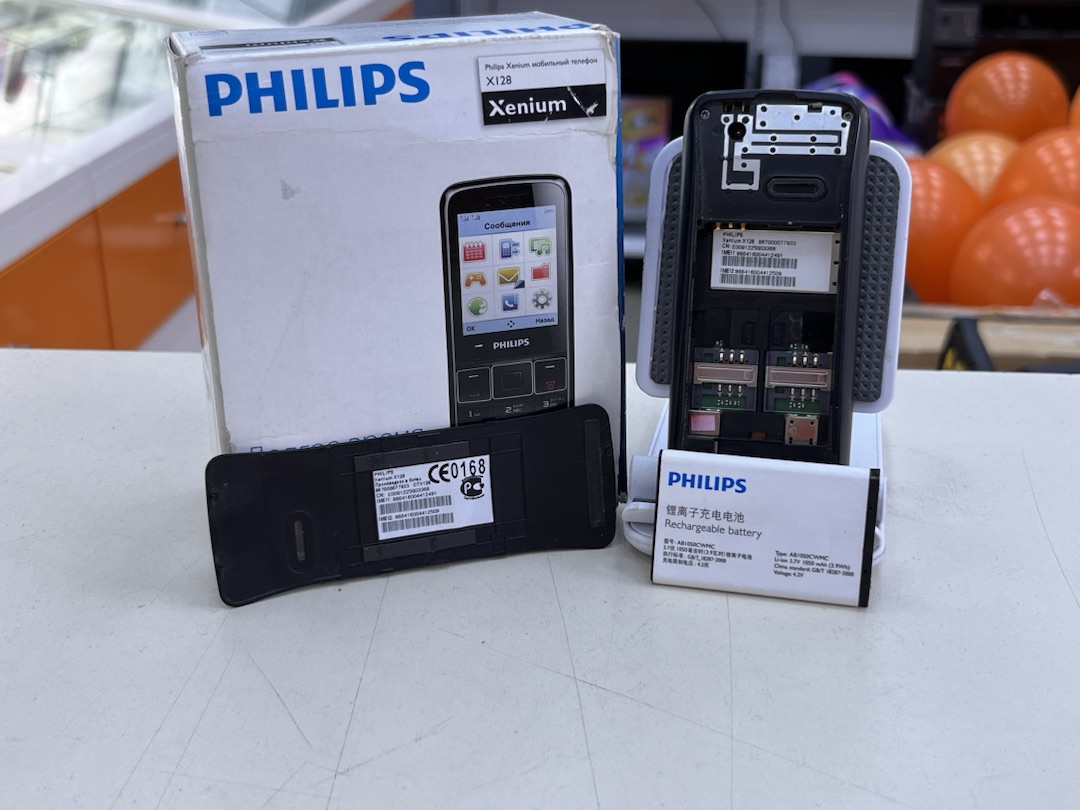 Мобильный телефон Philips X128