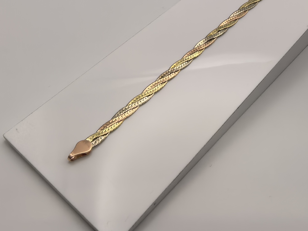 БРАСЛЕТ ПУСТОТЕЛЫЙ Косичка(монреаль) Au 585