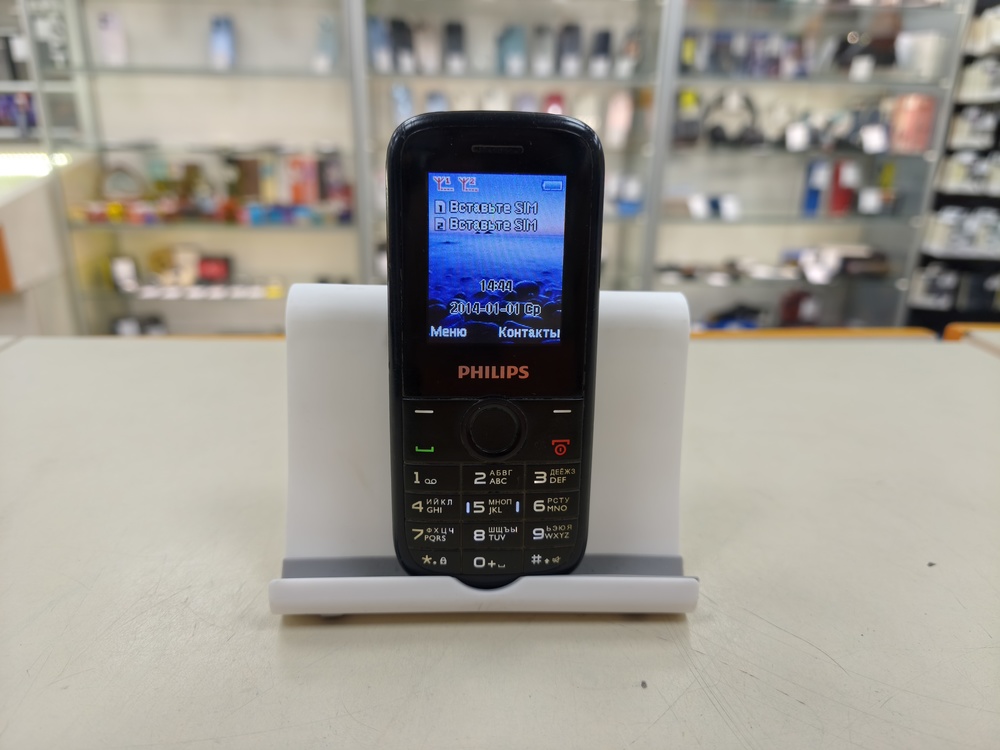 Мобильный телефон Philips E120