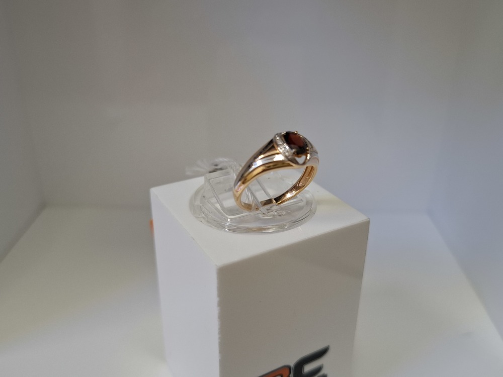 КОЛЬЦО С КАМНЯМИ (Au 585)